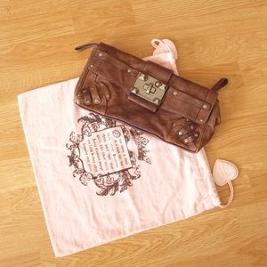 Juicy Couture clutch dark pink
